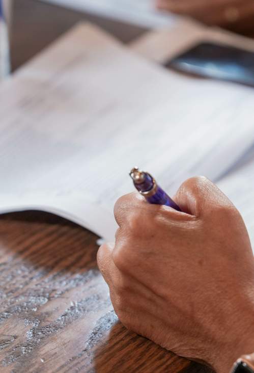 A woman filling out a loan application.