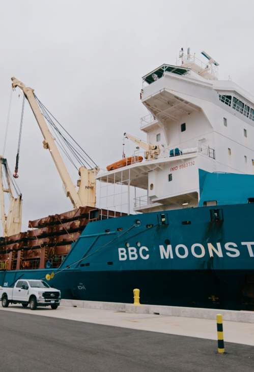 A ship with BBC Moonstone written on the side docked in Rhode Island.